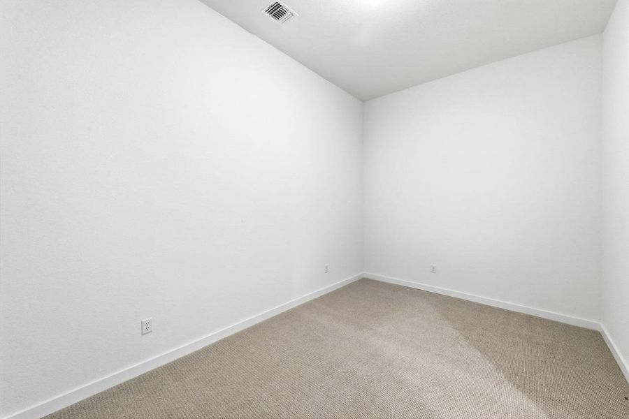 Spacious, unfurnished interior of a new home in 6 Creeks at Waterridge, Kyle (Image 13).