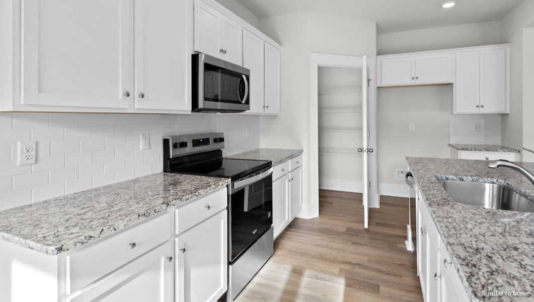 Furnished interior view inside a new home in Merchant Point, Jacksonville (Image 7). Furnished interior view inside a new home in Merchant Point, Jacksonville (Image 7).