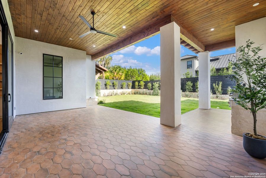 Exterior details and patio area of a home in , San Antonio (Image 25).