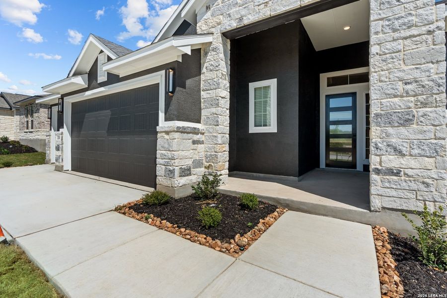Exterior details and patio area of a home in The Reserve at Potranco Oaks, Castroville (Image 2). Exterior details and patio area of a home in The Reserve at Potranco Oaks, Castroville (Image 2).