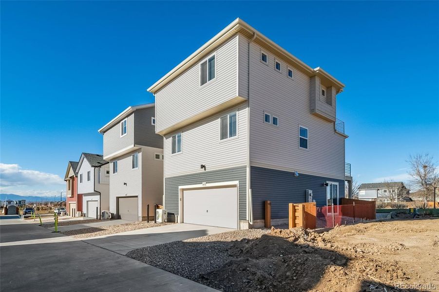 Exterior details and patio area of a home in , Commerce City (Image 26).