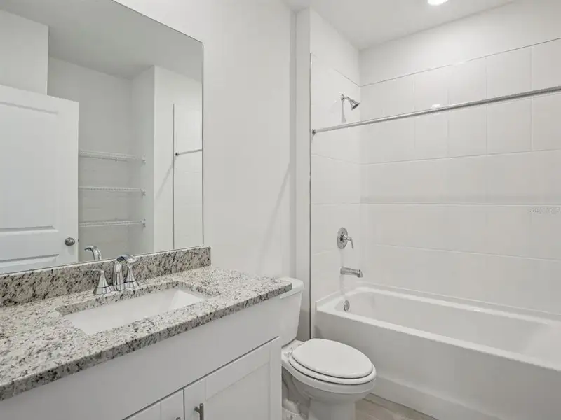 Furnished interior view inside a new home in Magnolia Bay - Premier Series, Nokomis (Image 4).