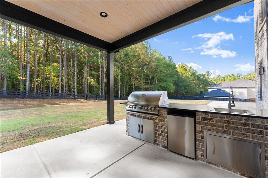 Exterior details and patio area of a home in , Hoschton (Image 39).