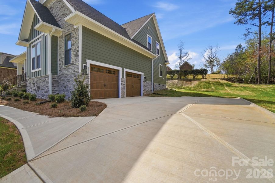 Front exterior of a new home in , Cherryville, NC, highlighting curb appeal (Image 27).