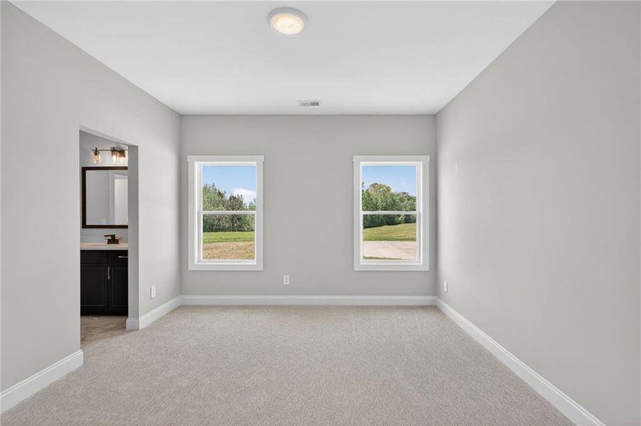 Spacious, unfurnished interior of a new home in The Meadows at Lake Circle, Buchanan (Image 47).