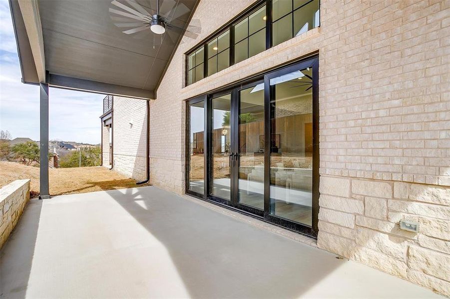 View of patio with ceiling fan