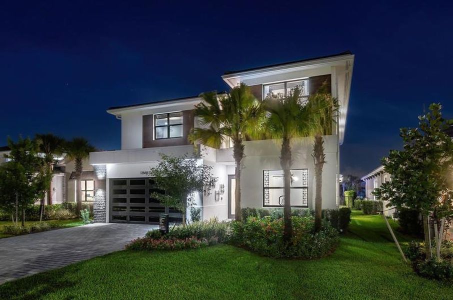 Front exterior of a new home in , Palm Beach Gardens, FL, highlighting curb appeal (Image 2). Front exterior of a new home in , Palm Beach Gardens, FL, highlighting curb appeal (Image 2).