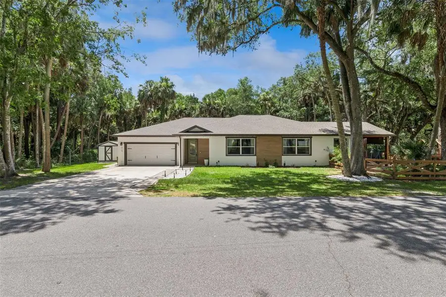 Front exterior of a new home in , Debary, FL, highlighting curb appeal (Image 2). Front exterior of a new home in , Debary, FL, highlighting curb appeal (Image 2).