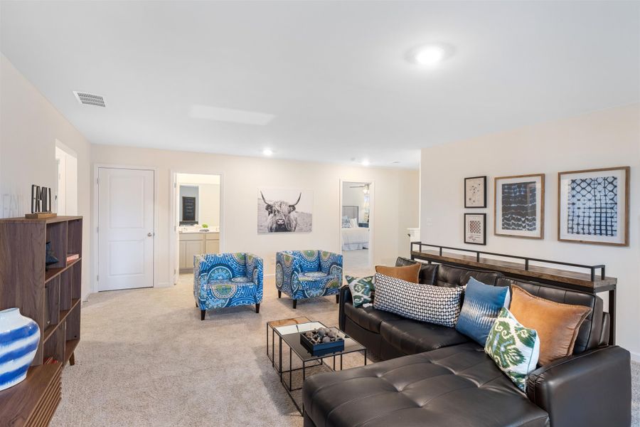 Representative furnished interior of a home built from the Mansfield by D.R. Horton in Sweet Briar, Ooltewah (Image 14).