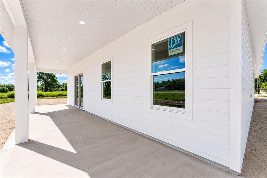 Exterior details and patio area of a home in , Williston (Image 6).