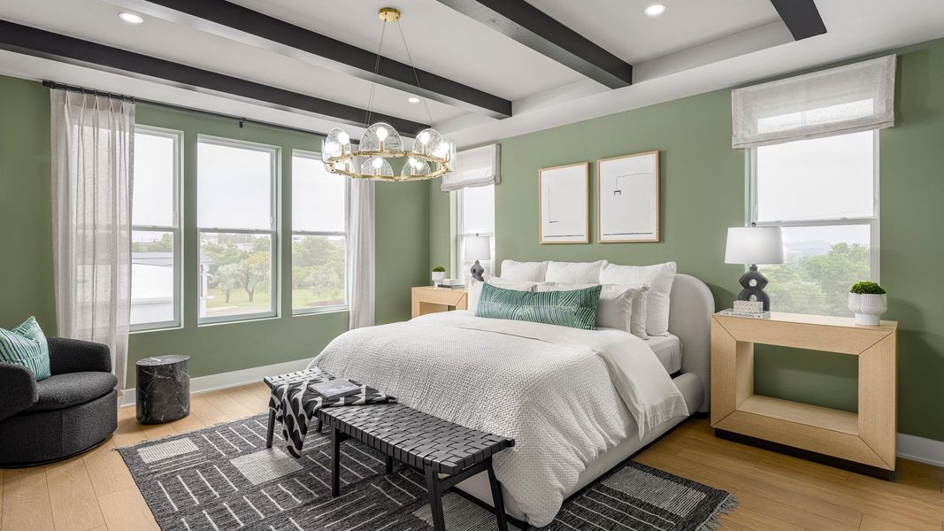 Serene primary bedroom suites boast a large walk-in closet and spa-like bathroom