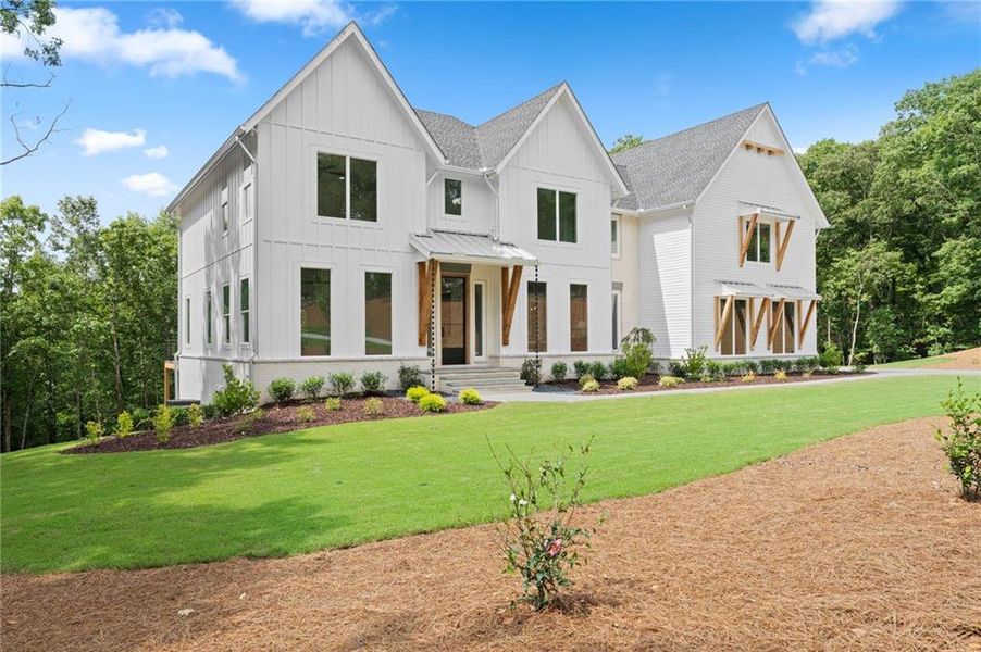 Front exterior of a new home in , Dawsonville, GA, highlighting curb appeal (Image 30).