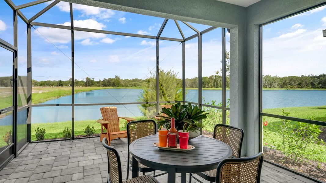 Exterior details and patio area of a home in Wildleaf, Parrish (Image 33).