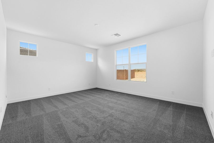 Spacious, unfurnished interior of a new home in Combs Ranch, San Tan Valley (Image 23).
