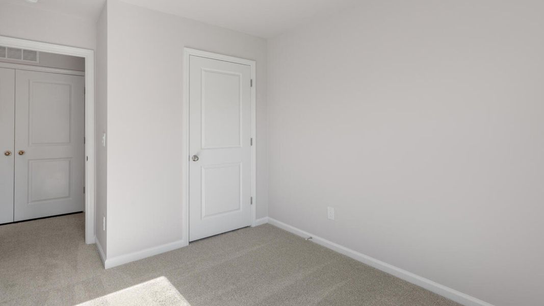 Spacious, unfurnished interior of a new home in Grayson Park Townhomes, Leland (Image 26).