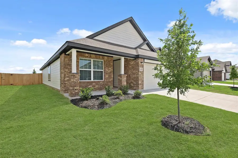 Front exterior of a new home in Sycamore Landing, Fort Worth, TX, highlighting curb appeal (Image 2).