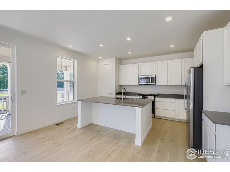 Furnished interior view inside a new home in Riano Ridge, Loveland (Image 7).