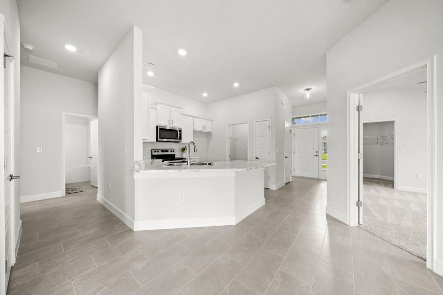 Representative furnished interior of a home built from the 1635 by Adams Homes in Winding Oaks, Weeki Wachee (Image 7).