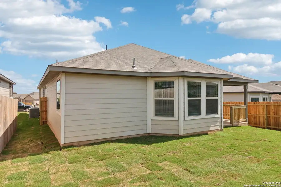 Front exterior of a new home in Lark Canyon, New Braunfels, TX, highlighting curb appeal (Image 2).