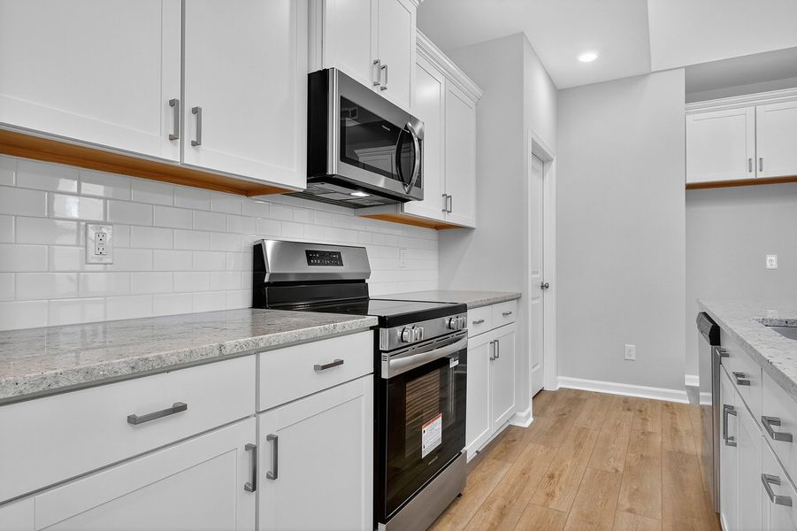 Furnished interior view inside a new home in Grand Park, Leland (Image 7). Furnished interior view inside a new home in Grand Park, Leland (Image 7).