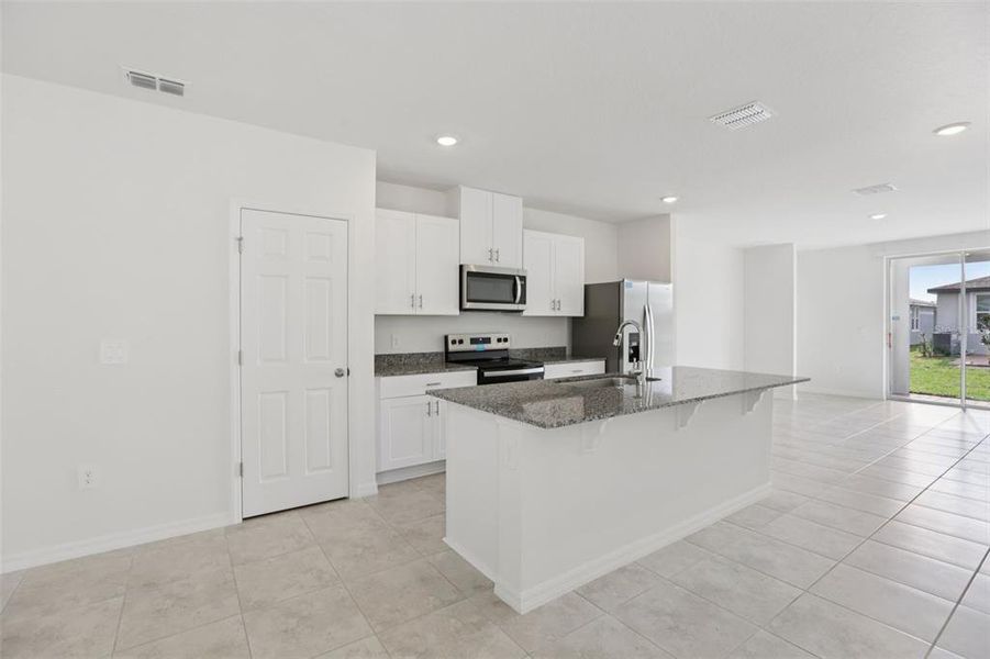 Furnished interior view inside a new home in Springs at Lake Alfred - Classic Series, Lake Alfred (Image 12).