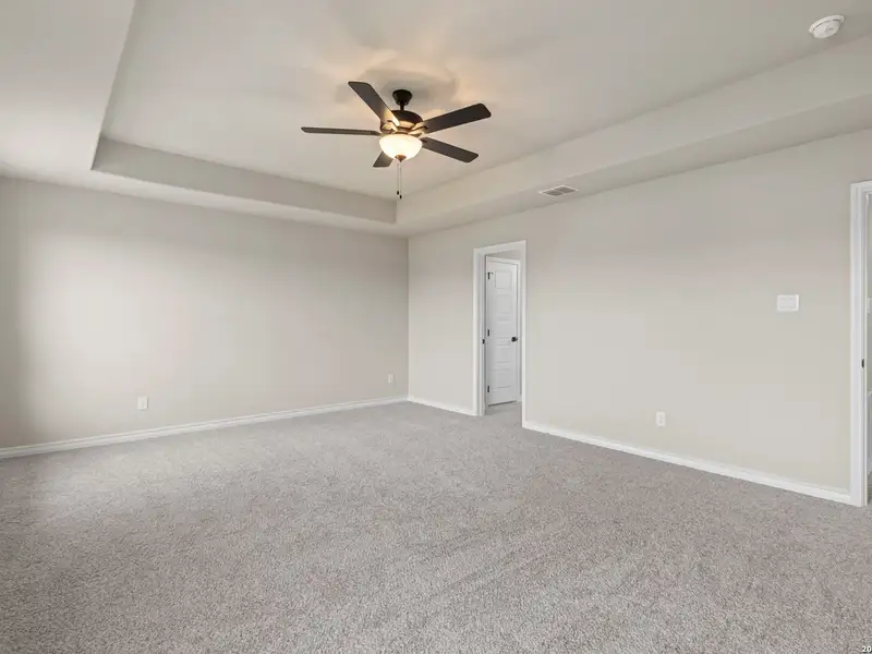 Spacious, unfurnished interior of a new home in The Reserve at Potranco Oaks, Castroville (Image 38).
