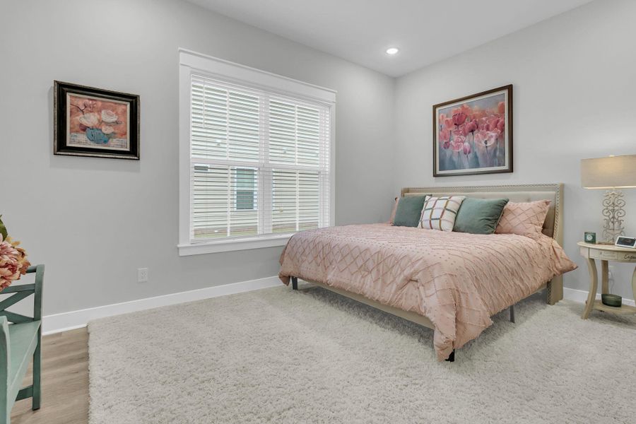 Furnished interior view inside a new home in K. Hovnanian's® Four Seasons at Lakes of Cane Bay, Summerville (Image 39).