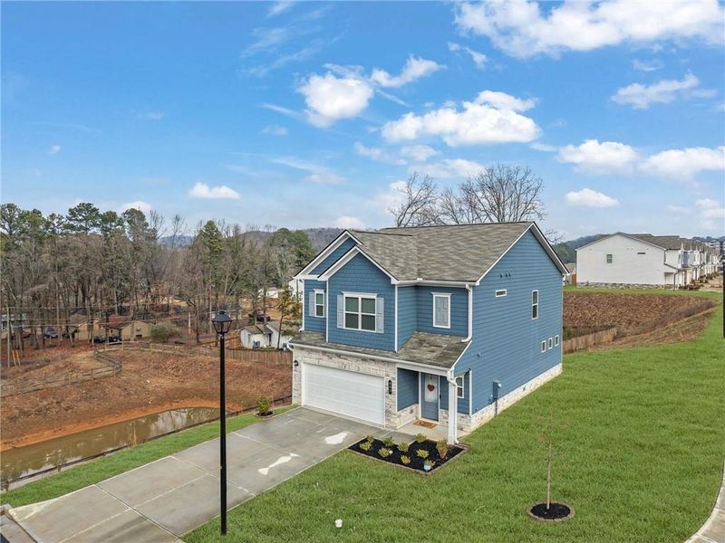 Front exterior of a new home in , Cartersville, GA, highlighting curb appeal (Image 2). Front exterior of a new home in , Cartersville, GA, highlighting curb appeal (Image 2).