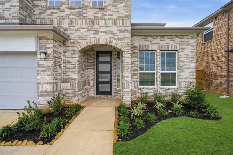 Exterior details and patio area of a home in Sunterra Lakes, Brookshire (Image 25). Exterior details and patio area of a home in Sunterra Lakes, Brookshire (Image 25).
