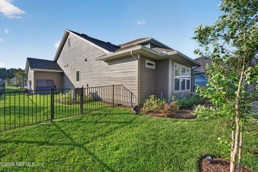 Exterior details and patio area of a home in , St. Johns (Image 33).