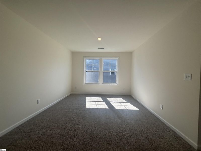 Spacious, unfurnished interior of a new home in Halton Oaks, Spartanburg (Image 12).