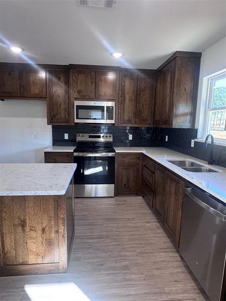Furnished interior view inside a new home in , Springtown (Image 4).