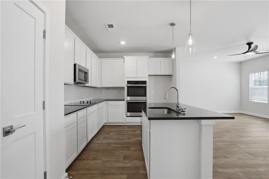 Furnished interior view inside a new home in Crossvine Village, LaGrange (Image 3).