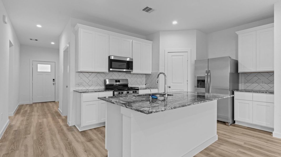 Furnished interior view inside a new home in Watermark, Alvin (Image 4).