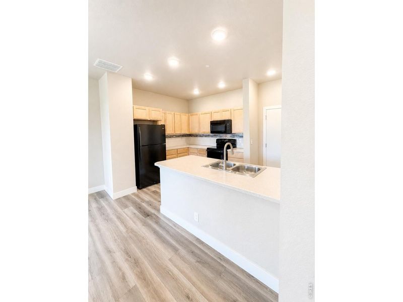 Furnished interior view inside a new home in Northridge Trails Townhomes, Greeley (Image 4).