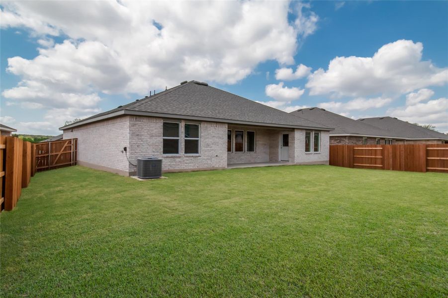Front exterior of a new home in Riverview, Georgetown, TX, highlighting curb appeal (Image 14). Front exterior of a new home in Riverview, Georgetown, TX, highlighting curb appeal (Image 14).