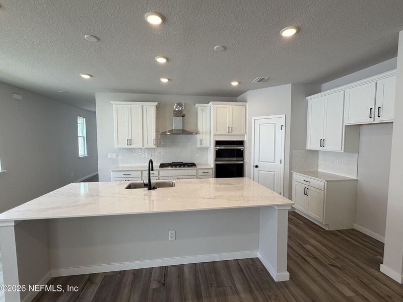Furnished interior view inside a new home in Reserve East, Flagler Beach (Image 7).