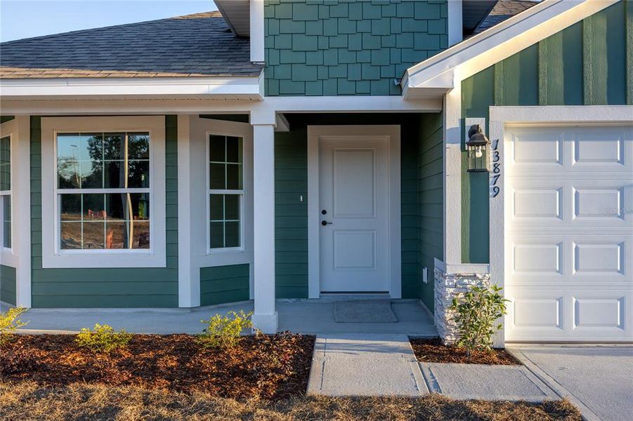 Exterior details and patio area of a home in Briarwood, Alachua (Image 20).