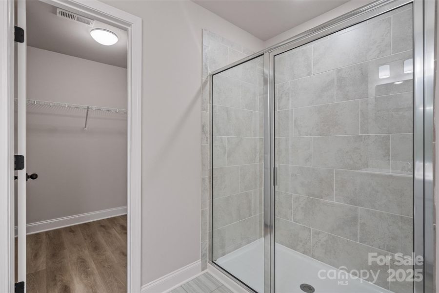 Tile in shower is not an option in this home. Master closet will have carpet. Tile in shower is not an option in this home. Master closet will have carpet.