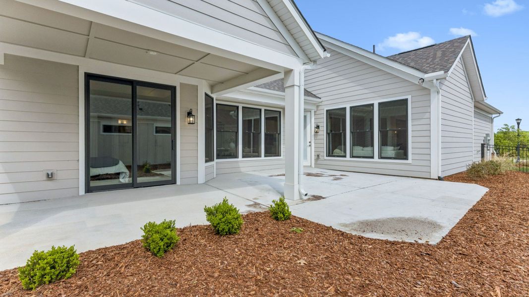 Exterior details and patio area of a home in The Courtyards at Stewarts Creek, Smyrna (Image 29).
