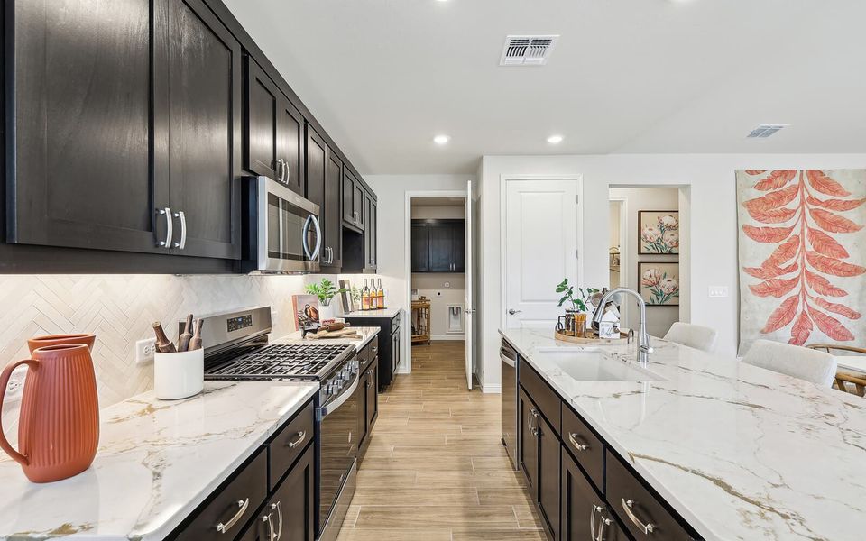 Representative furnished interior of a home built from the Reed by Brookfield Residential in Traditional at Kissing Tree, San Marcos (Image 6). Representative furnished interior of a home built from the Reed by Brookfield Residential in Traditional at Kissing Tree, San Marcos (Image 6).
