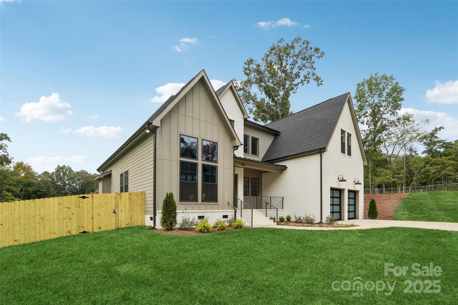 Front exterior of a new home in , Charlotte, NC, highlighting curb appeal (Image 25).