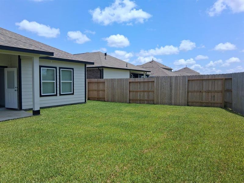 Front exterior of a new home in Windrose Green, Angleton, TX, highlighting curb appeal (Image 1). Front exterior of a new home in Windrose Green, Angleton, TX, highlighting curb appeal (Image 1).