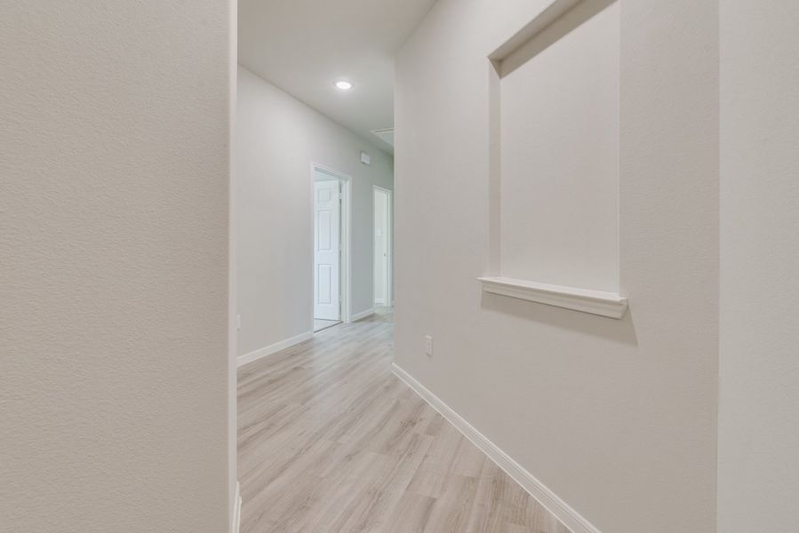 Representative unfurnished interior of a home built from the Floor Plan 1784 by Colina Homes in Tidwell Lakes, Houston (Image 24).