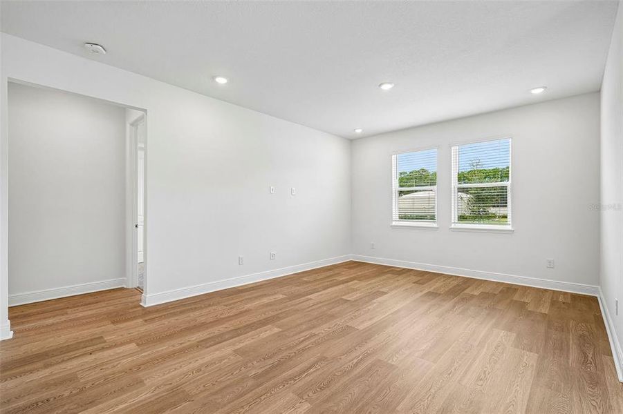 Spacious, unfurnished interior of a new home in Legends Preserve - Signature Series, Daytona Beach (Image 32).