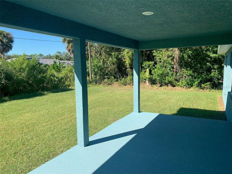 Exterior details and patio area of a home in Port Charlotte, Port Charlotte (Image 2).