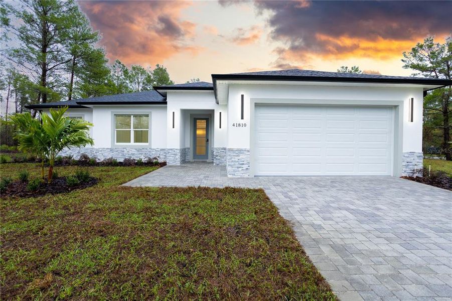 Front exterior of a new home in , Eustis, FL, highlighting curb appeal (Image 22).