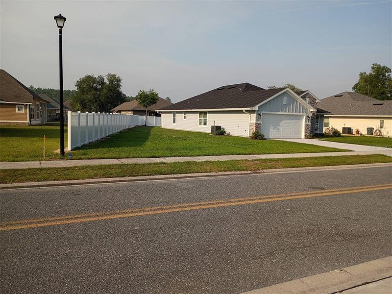 Front exterior of a new home in , Lake City, FL, highlighting curb appeal (Image 26).