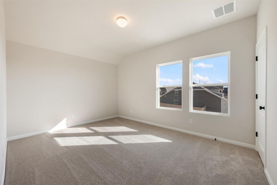 Spacious, unfurnished interior of a new home in The Colony 50s, Bastrop (Image 19).
