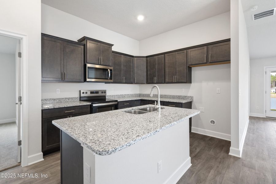 Furnished interior view inside a new home in Shadow Crest at Rolling Hills, Green Cove Springs (Image 4).